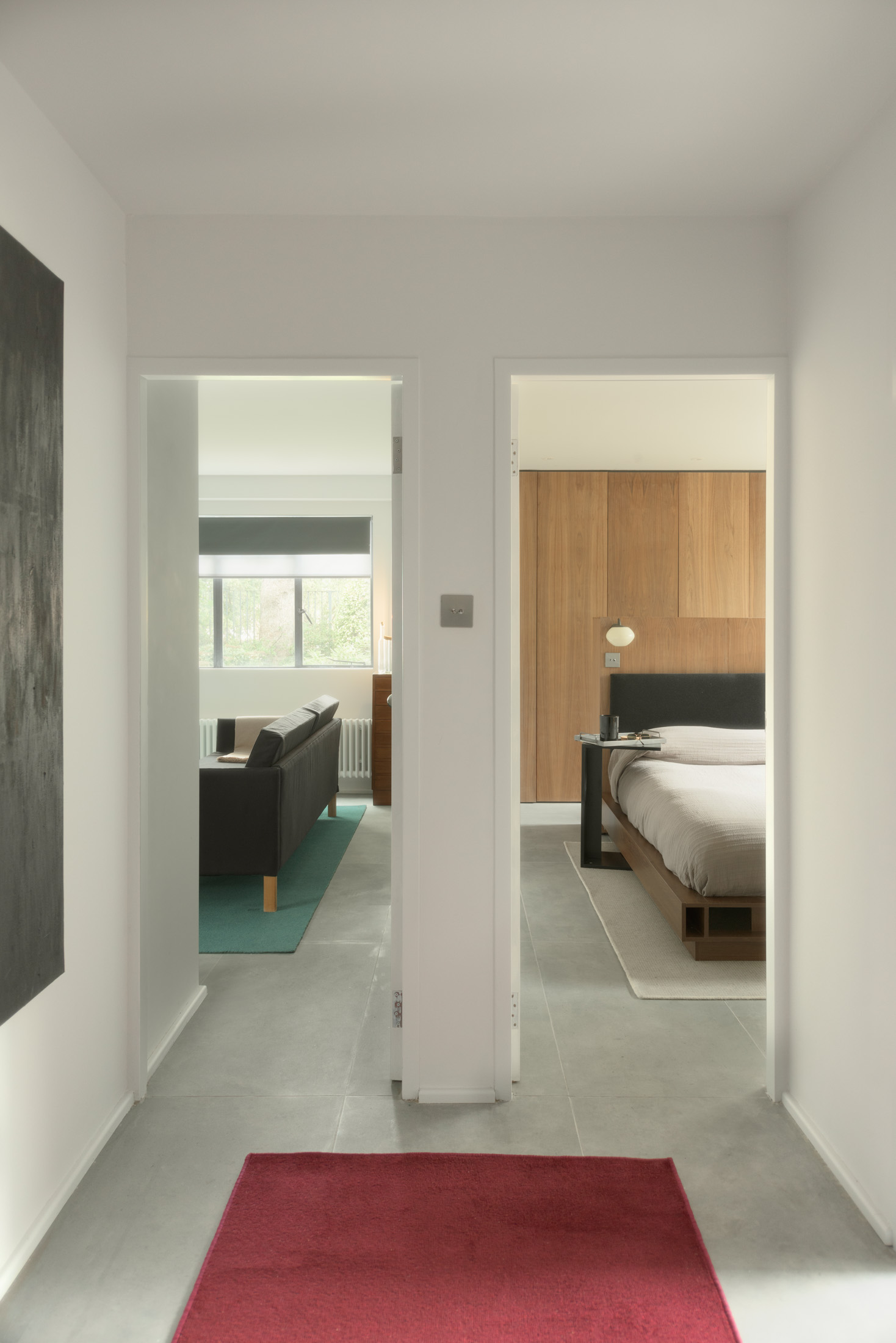 View through aligned doorways into the living room and main bedroom